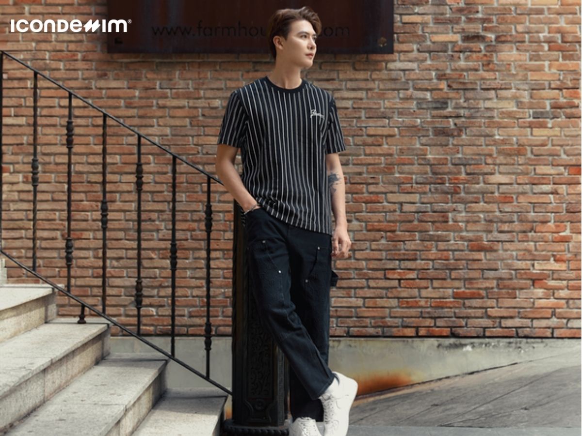 Áo kẻ sọc phối với quần đen giúp bạn che khuyết điểm hiệu quả