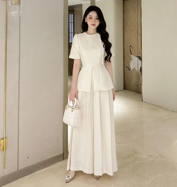 Chân váy midi dịu dàng mix cùng áo trễ vai quyến rũ