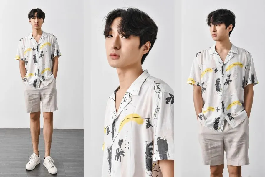Áo sơ mi họa tiết phối cùng quần short trơn mang lại vẻ ngoài trẻ trung, năng động.